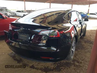 2022 Tesla Model 3 Long Range with VIN 5YJ3E1EB3NF257077, listed as a IAAI auction lot 42086629 with Not Provided miles and . Bid and sale history available at DreamBid. Image 4.