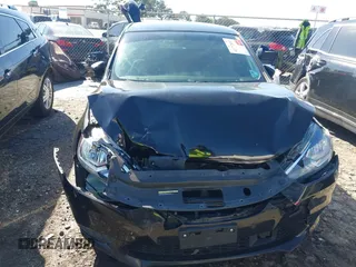 2019 Nissan Sentra S with VIN 3N1AB7AP8KY415002, listed as a IAAI auction lot 41772857 with 95,898 mi miles and . Bid and sale history available at DreamBid. Image 12.