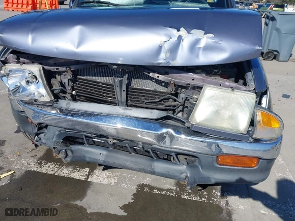 1998 Toyota Tacoma with VIN 4TANL42N8WZ136647, listed as a IAAI auction lot 41635748 with 218,836 mi miles. Bid and sale history available at carsss.com. Image 6.