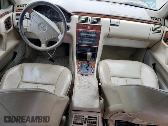 1998 Mercedes-Benz E-Class with VIN WDBJF65F6WA590094, listed as a Copart auction lot 72751984 with 196,048 mi miles and Salvage Title. Bid and sale history available at carsss.com. Image 8.