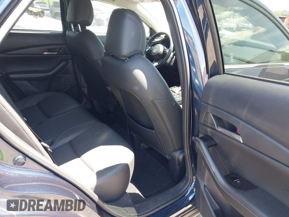 2024 Mazda CX-30 S Select Sport with VIN 3MVDMBBM2RM657781, listed as a IAAI auction lot 42297311 with 13,677 mi miles and . Bid and sale history available at DreamBid. Image 8.