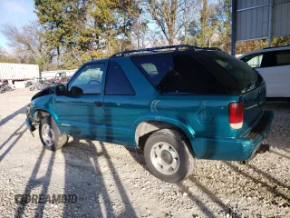 1995 GMC Jimmy SLS Base with VIN 1GKCS18WXS2519056, listed as a Copart auction lot 79313514 with 161,002 mi miles and Salvage Title. Bid and sale history available at carsss.com. Image 2.