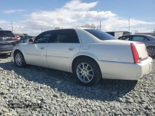 2010 Cadillac DTS w/1SC with VIN 1G6KD5EY1AU128589, listed as a Copart auction lot 49319535 with 115,086 mi miles and Salvage Title. Bid and sale history available at carsss.com. Image 2.