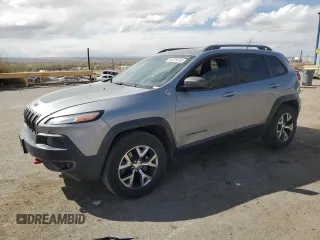 2015 Jeep Cherokee Trailhawk z VIN 1C4PJMBS8FW641128, wystawiony jako Copart lot #51231315 z przebiegiem 200 139 mil mil oraz Szkoda całkowita • Salvage title. Historia ofert i sprzedaży dostępna na DreamBid. Obrazek 1.