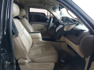 2014 Chevrolet Tahoe LT z VIN 1GNSCBE01ER190342, wystawiony jako IAAI lot #41578109 z przebiegiem 204 781 mil mil oraz . Historia ofert i sprzedaży dostępna na DreamBid. Obrazek 5.