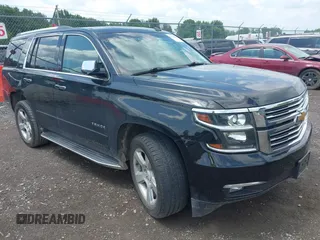 2015 Chevrolet Tahoe LTZ with VIN 1GNSKCKC0FR140539, listed as a IAAI auction lot 42556860 with 107,745 mi miles and . Bid and sale history available at DreamBid. Image 1.