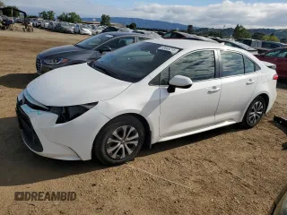 2022 Toyota Corolla Hybrid LE with VIN JTDEAMDE4NJ042155, listed as a Copart auction lot 53845215 with 28,254 mi miles and Salvage Title. Bid and sale history available at carsss.com. Image 1.