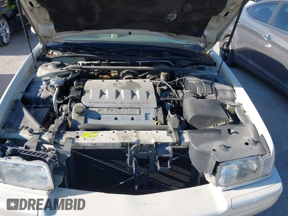 2000 Cadillac Eldorado Touring ETC z VIN 1G6ET1292YU188056, wystawiony jako IAAI lot #41671661 z przebiegiem 139 138 mil mil oraz . Historia ofert i sprzedaży dostępna na DreamBid. Obrazek 10.