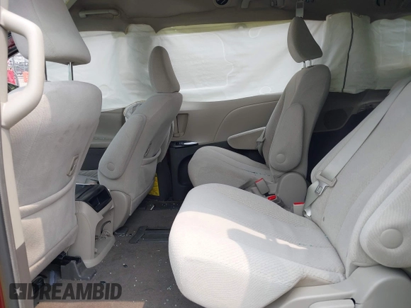 2012 Toyota Sienna LE AAS with VIN 5TDKK3DC1CS213064, listed as a IAAI auction lot 42414677 with 63,699 mi miles and . Bid and sale history available at DreamBid. Image 8.