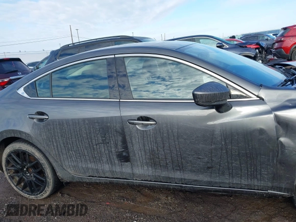 2020 Mazda 6 Grand Touring with VIN JM1GL1TY0L1521859, listed as a IAAI auction lot 41634368 with 36,709 mi miles and . Bid and sale history available at DreamBid. Image 13.