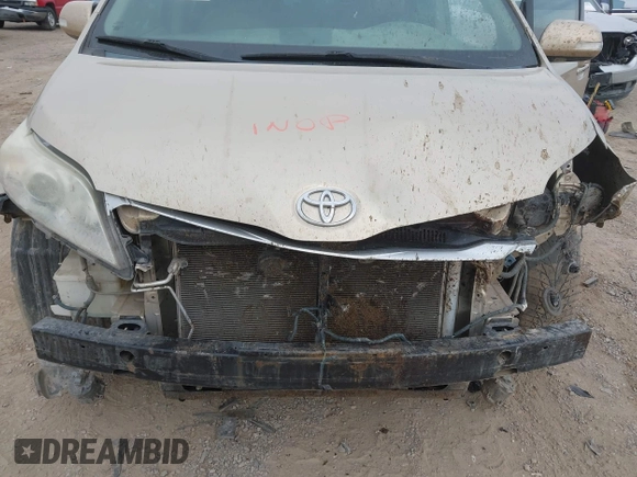 2013 Toyota Sienna XLE AAS with VIN 5TDYK3DC1DS333877, listed as a IAAI auction lot 40481401 with 183,658 mi miles and . Bid and sale history available at carsss.com. Image 6.