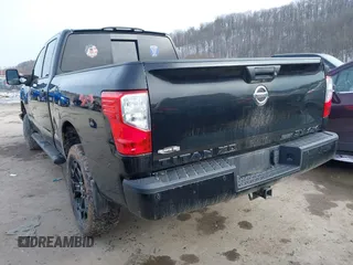 2018 Nissan Titan XD SV with VIN 1N6BA1F49JN521838, listed as a IAAI auction lot 41606878 with 143,742 mi miles. Bid and sale history available at carsss.com. Image 3.