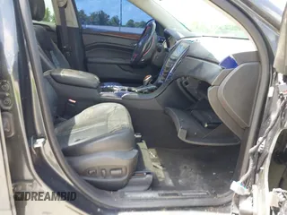 2015 Cadillac SRX Performance Collection with VIN 3GYFNCE31FS605298, listed as a IAAI auction lot 42859993 with 99,192 mi miles and . Bid and sale history available at DreamBid. Image 5.