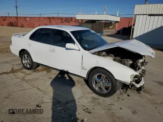 1992 Toyota Camry LE z VIN 4T1SK12E8NU044387, wystawiony jako Copart lot #43195915 z przebiegiem 279 199 mil mil oraz Szkoda całkowita • Salvage title. Historia ofert i sprzedaży dostępna na DreamBid. Obrazek 4.