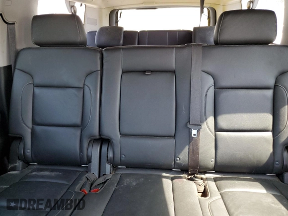 2019 Chevrolet Suburban LT with VIN 1GNSCHKC2KR167309, listed as a Copart auction lot 54475565 with 140,552 mi miles and Salvage Title. Bid and sale history available at DreamBid. Image 10.