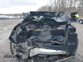 2022 Tesla Model Y Long Range with VIN 7SAYGDEE5NA016892, listed as a IAAI auction lot 41936735 with 69,136 mi miles and . Bid and sale history available at carsss.com. Image 16.