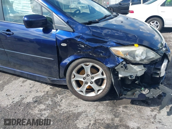 2009 Mazda 5 Sport with VIN JM1CR29L390355978, listed as a IAAI auction lot 41609117 with 118,588 mi miles and . Bid and sale history available at DreamBid. Image 6.