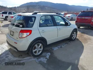 2008 Suzuki SX4 with VIN JS2YB413885101448, listed as a IAAI auction lot 41569235 with 130,633 mi miles. Bid and sale history available at carsss.com. Image 4.