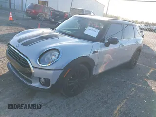 2019 MINI Clubman Cooper with VIN WMWLN5C56K2E34756, listed as a IAAI auction lot 41916663 with 85,860 mi miles and . Bid and sale history available at DreamBid. Image 2.