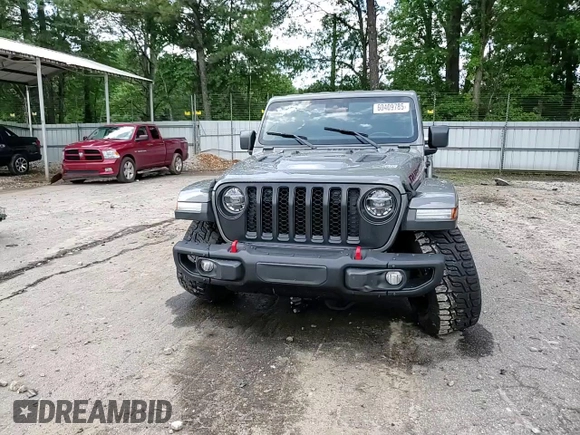 2021 Jeep Gladiator Rubicon с VIN 1C6JJTBG5ML507579, выставлен на аукционе Copart как лот 60409785 с пробегом 62 585 миль миль и Списание • Salvage title. История ставок и продаж доступна на DreamBid. Изображение 13.