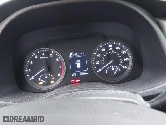 2016 Hyundai Tucson Sport with VIN KM8J33A21GU254828, listed as a IAAI auction lot 41297692 with 134,394 mi miles. Bid and sale history available at carsss.com. Image 7.