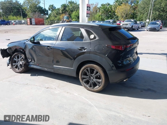 2022 Mazda CX-30 2.5 Turbo with VIN 3MVDMBAY3NM440688, listed as a IAAI auction lot 40860258 with 27,445 mi miles and . Bid and sale history available at DreamBid. Image 3.