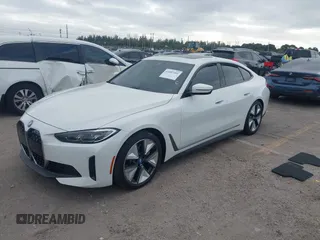 2023 BMW i4 eDrive40 z VIN WBY73AW02PFP24894, wystawiony jako IAAI lot #41097491 z przebiegiem 26 815 mil mil oraz . Historia ofert i sprzedaży dostępna na DreamBid. Obrazek 17.
