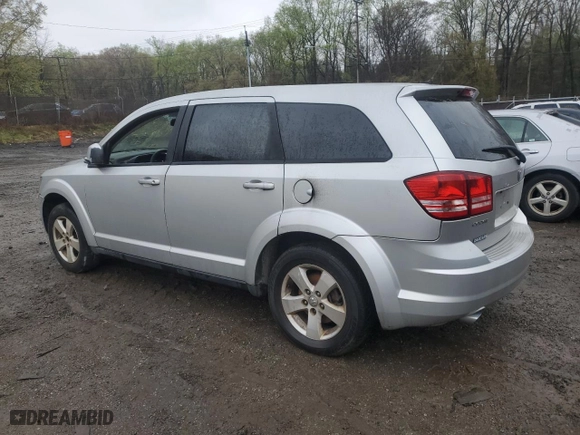 2009 Dodge Journey SXT with VIN 3D4GG57V29T594070, listed as a Copart auction lot 51767195 with 176,242 mi miles and Salvage Title. Bid and sale history available at carsss.com. Image 2.