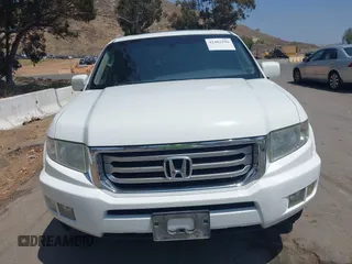 2012 Honda Ridgeline RTL z VIN 5FPYK1F57CB455267, wystawiony jako IAAI lot #42462296 z przebiegiem 186 451 mil mil oraz . Historia ofert i sprzedaży dostępna na DreamBid. Obrazek 6.