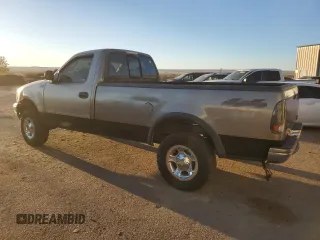2002 Ford F-150 XL with VIN 1FTRF18262NB35586, listed as a Copart auction lot 77114114 with 166,942 mi miles and Salvage title. Bid and sale history available at DreamBid. Image 2.