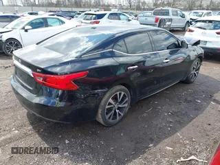 2017 Nissan Maxima SV with VIN 1N4AA6AP0HC373183, listed as a IAAI auction lot 41877877 with 137,478 mi miles and . Bid and sale history available at DreamBid. Image 4.