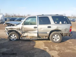 2003 Chevrolet Tahoe LS with VIN 1GNEK13V03J154985, listed as a IAAI auction lot 41708954 with 203,826 mi miles. Bid and sale history available at carsss.com. Image 14.