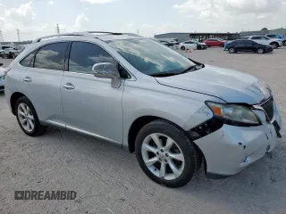 2012 Lexus RX 350 with VIN 2T2ZK1BA6CC067060, listed as a Copart auction lot 61876915 with 202,055 mi miles and Salvage title. Bid and sale history available at DreamBid. Image 4.