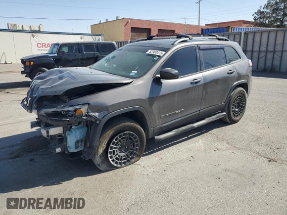 2021 Jeep Cherokee 80th Anniversary with VIN 1C4PJMMX2MD106233, listed as a Copart auction lot 52980415 with 77,979 mi miles and Salvage title. Bid and sale history available at DreamBid. Image 1.