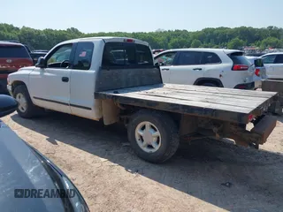 1998 Dodge Dakota SLT z VIN 1B7GL22X9WS620905, wystawiony jako IAAI lot #42388299 z przebiegiem 146 315 mil mil oraz . Historia ofert i sprzedaży dostępna na DreamBid. Obrazek 3.