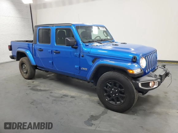 2023 Jeep Gladiator Overland z VIN 1C6HJTFG6PL564337, wystawiony jako Copart lot #59620315 z przebiegiem 31 552 mil mil oraz Czysty tytuł • Clean title. Historia ofert i sprzedaży dostępna na DreamBid. Obrazek 4.