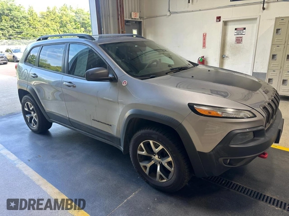 2014 Jeep Cherokee Trailhawk with VIN 1C4PJMBS4EW111480, listed as a Copart auction lot 67399485 with 162,555 mi miles and Clean title. Bid and sale history available at DreamBid. Image 1.