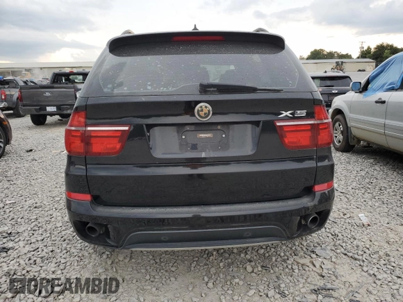 2012 BMW X5 35i with VIN 5UXZV4C59CL763577, listed as a Copart auction lot 62496155 with 148,240 mi miles and Clean title. Bid and sale history available at DreamBid. Image 6.
