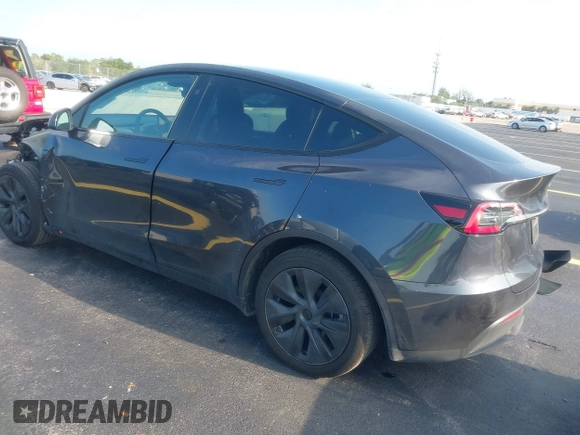 2024 Tesla Model Y with VIN 7SAYGDED3RA329355, listed as a IAAI auction lot 42343269 with 8,334 mi miles and . Bid and sale history available at DreamBid. Image 3.