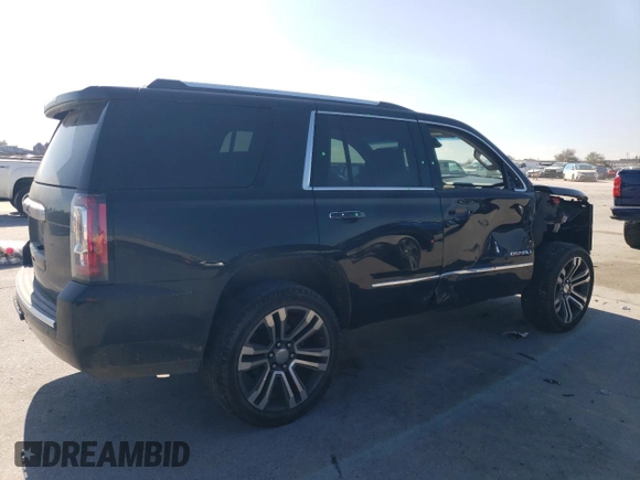 2017 GMC Yukon Denali with VIN 1GKS1CKJ5HR363368, listed as a Copart auction lot 46167715 with 134,515 mi miles and Salvage Title. Bid and sale history available at carsss.com. Image 3.