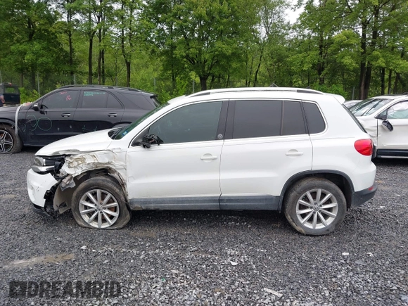2017 Volkswagen Tiguan Wolfsburg Edition with VIN WVGRV7AX9HK002659, listed as a IAAI auction lot 42482438 with 88,841 mi miles and . Bid and sale history available at DreamBid. Image 14.