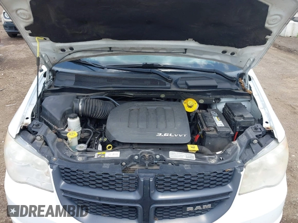 2014 Ram Cargo Van Tradesman with VIN 2C4RRGAGXER459213, listed as a IAAI auction lot 42590594 with 174,217 mi miles and . Bid and sale history available at DreamBid. Image 10.