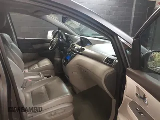 2016 Honda Odyssey EX-L with VIN 5FNRL5H61GB138100, listed as a IAAI auction lot 41548666 with 127,780 mi miles. Bid and sale history available at carsss.com. Image 5.