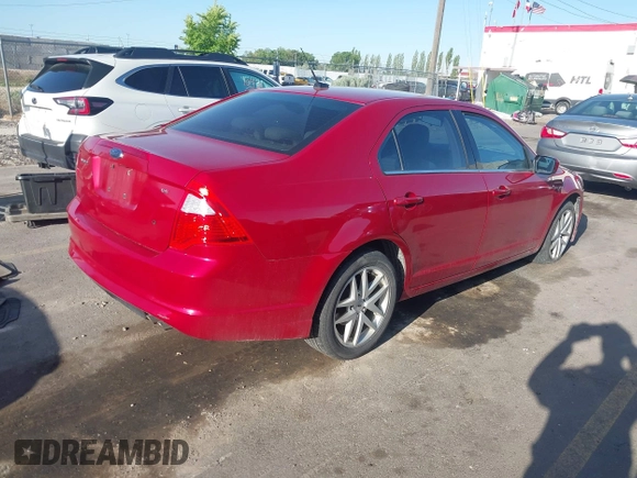 2010 Ford Fusion SE z VIN 3FAHP0HA9AR256835, wystawiony jako IAAI lot #42228249 z przebiegiem 200 519 mil mil oraz . Historia ofert i sprzedaży dostępna na DreamBid. Obrazek 4.