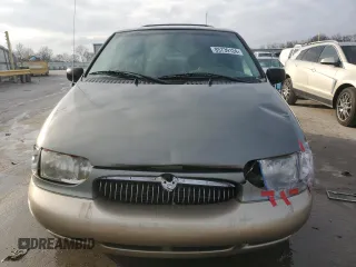 1999 Mercury Villager z VIN 4M2XV11T9XDJ01582, wystawiony jako Copart lot #85739124 z przebiegiem 343 801 mil mil oraz Szkody całkowita. Historia ofert i sprzedaży dostępna na DreamBid. Obrazek 5.