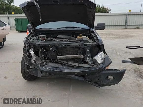 2014 Ford F-150 XL с VIN 1FTEX1CM2EFD08068, выставлен на аукционе Copart как лот 63502095 с пробегом Не указан миль и Списание • Salvage title. История ставок и продаж доступна на DreamBid. Изображение 13.