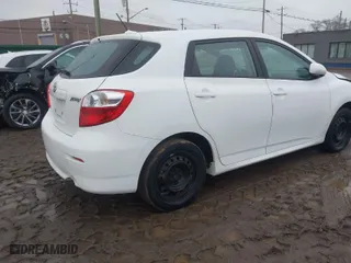 2009 Toyota Matrix with VIN 2T1KU40E99C144729, listed as a IAAI auction lot 41685551 with 116,299 mi miles. Bid and sale history available at carsss.com. Image 4.