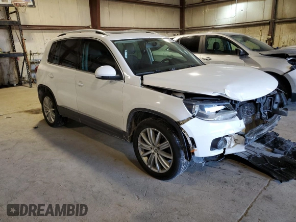 2012 Volkswagen Tiguan SE with VIN WVGAV7AX8CW533592, listed as a Copart auction lot 43246395 with 149,928 mi miles and Salvage Title. Bid and sale history available at DreamBid. Image 4.