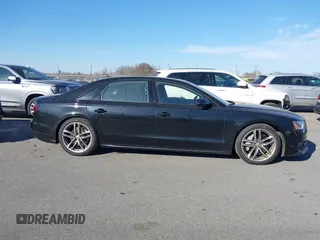 2017 Audi A8 with VIN WAU44AFD0HN017821, listed as a IAAI auction lot 41676097 with 107,378 mi miles and . Bid and sale history available at DreamBid. Image 13.