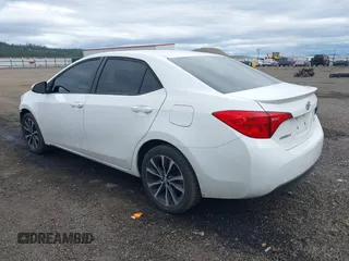 2019 Toyota Corolla L with VIN 5YFBURHE1KP937059, listed as a IAAI auction lot 41901278 with 98,796 mi miles and . Bid and sale history available at DreamBid. Image 3.